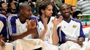 bynum_gasol_kobe_benchshot Laker big men Andrew Bynum and Pau Gasol (middle) were thoroughly outplayed by the Rockets' big men in Game 6. Kobe Bryant needs to inspire his team for Game 7. (NBAE/GETTY IMAGES)